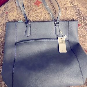 Urban Expressions tote. Large front zipper pocket.